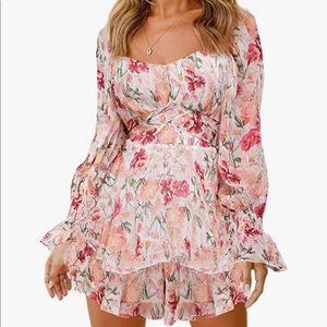 Long Sleeve Floral Romper with Chiffon Materials and Ruffle details. Size M